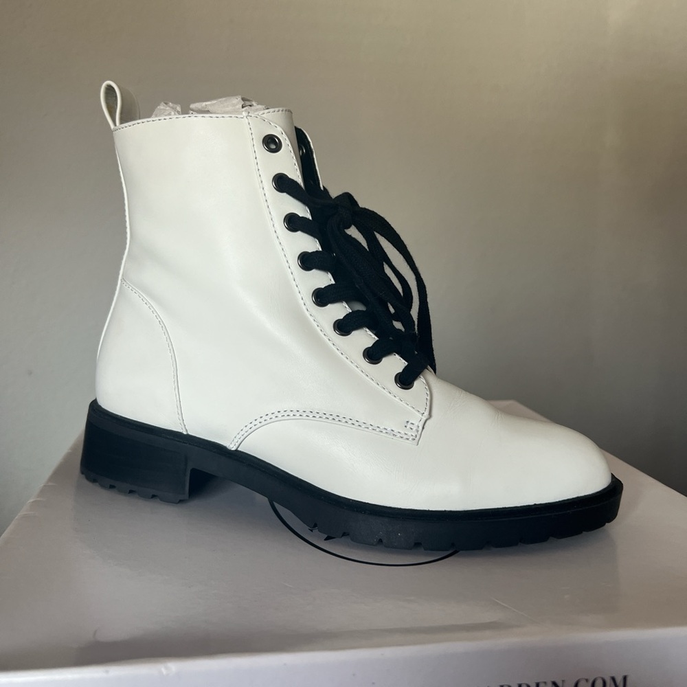White and black combat boots